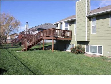 Fenced Yard with Deck, Fence and Sprinkler System
