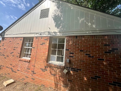 View of home's exterior with brick siding