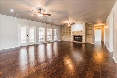 Living Room with Built-Ins and Fireplace