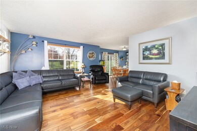 Living area with light wood-style flooring