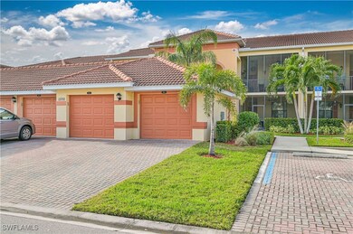 View of front of property  with pavered driveway