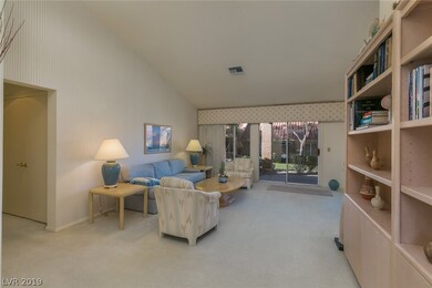 Living Room With Vaulted Ceiling And Greenbelt Vie