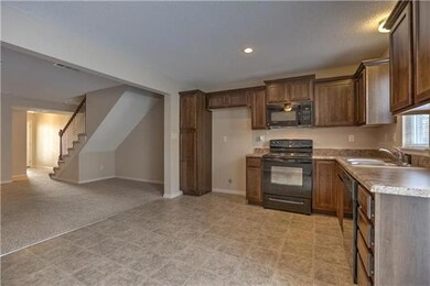 256 Pointe Ln, Raymore, MO 64083 - photo 6