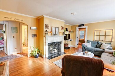 Living Room with original hardwood floors, plenty 