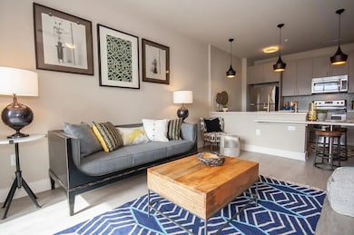 Living room featuring light hardwood / wood-style 