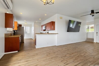 Back in the living room, use the hallway on the ri