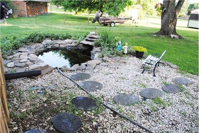 Beautiful Koi Pond off carport in the back yard!!