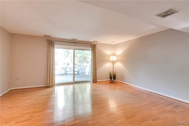 Living room with laminate wood floor and Anderson