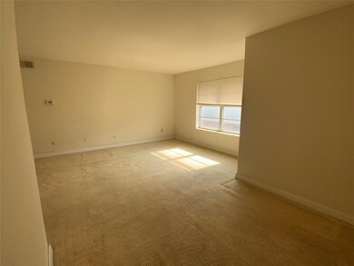 View from dining room into living area.