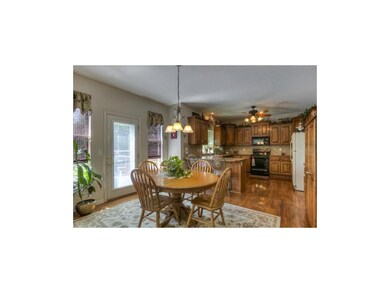 Breakfast room sits between great room and kitchen