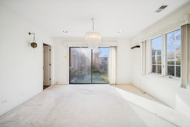 with sliders leading to garden and patio