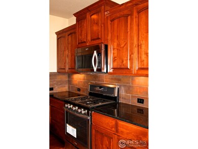 Kitchen with Knotty Alder cabinets