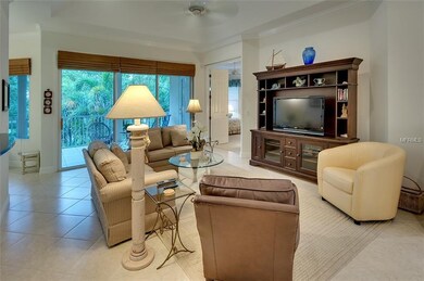 Living room with high ceilings and lots of natural