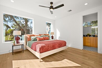 Bedroom featuring recessed lighting, light wood f