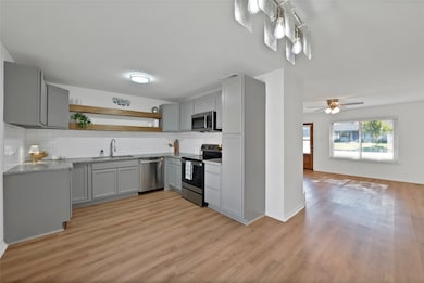 Updated kitchen and dining area open to living space