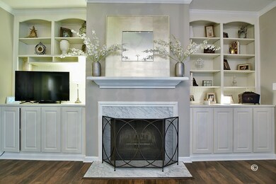 LIVING ROOM WITH WOOD BURNING FIREPLACE