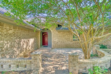 This is the front entry with a bricked surround an