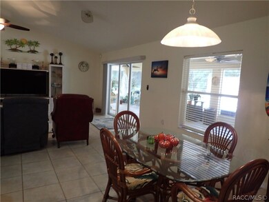 Eat in breakfast nook looking towards sliders to l