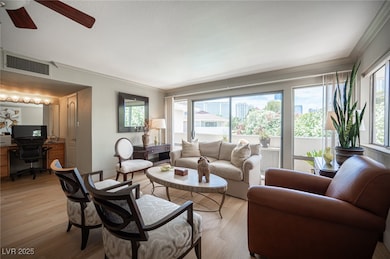 Living room featuring an office area, ornamental m