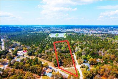 Bird's eye view featuring a wooded view