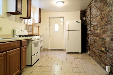 Kitchen:  9x15, main floor, door goes to back yard