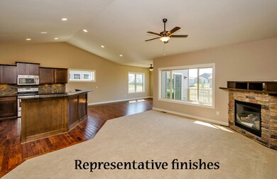 Living room, towards kitchen and sunroom