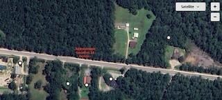 Sign on property, culvert in place.