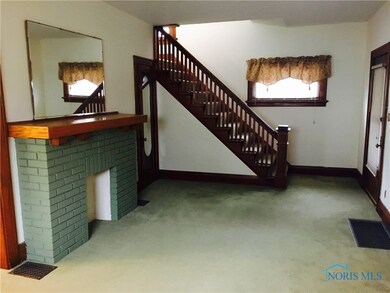 Beautiful woodwork kept on original stairway, also