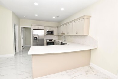 Kitchen with sink, tasteful backsplash, kitchen pe