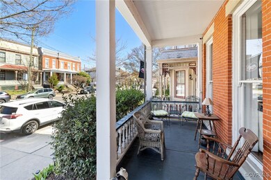 Front porch is ideal for watching the passing para