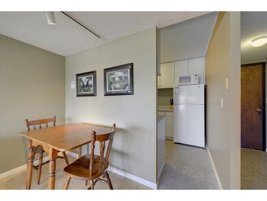 Informal dining area just off kitchen with easy to