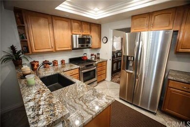 The kitchen  also features a farm sink and recesse