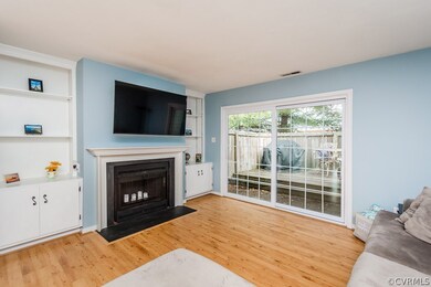 FAMILY ROOM W/ BUILT-INS. FIREPLACE, HW FLOORS, SL