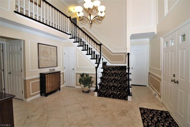 Elegant marble floored foyer.