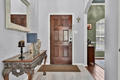 View of the entry way and formal dining or flex room is now on the right!