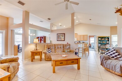 Living room over looking dining and kitchen