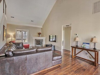 Spacious Great Room w/ elevated ceilings, gas burn