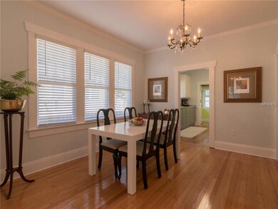Spacious Dining Room with Classic Triple Windows. 