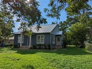 View of front of home featuring a standing seam r