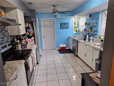 Kitchen with appliances with stainless steel finis