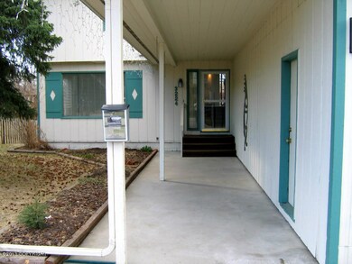 Covered front entrance.