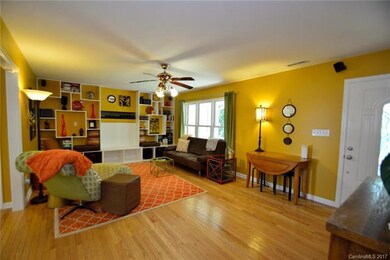 Large Living Room complete with Hardwood floors an