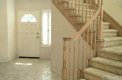 Lovely foyer entrance with stone floors