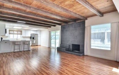 Wood beamed ceilings, remodeled kitchen, and newer