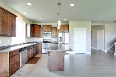 Ample counter and cabinet space with large pantry.