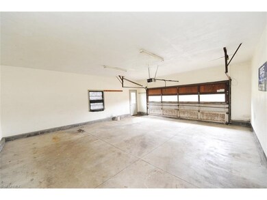 Oversized 2 Car Garage With 2 Side/Back Man Doors