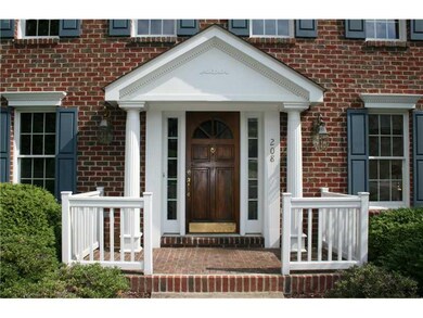 Exterior Front. The level entry sidewalk leads to 