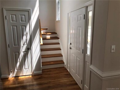 Natural light flooding in from large window and lu