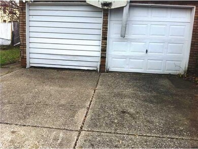 Other 2 car garage and spacious concrete driveway