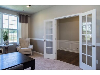 Private home office with glass French doors off th